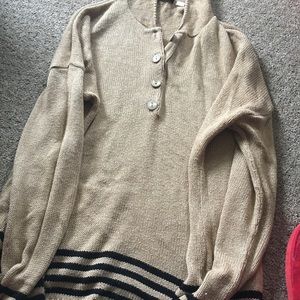 Brown pullover with stripes
